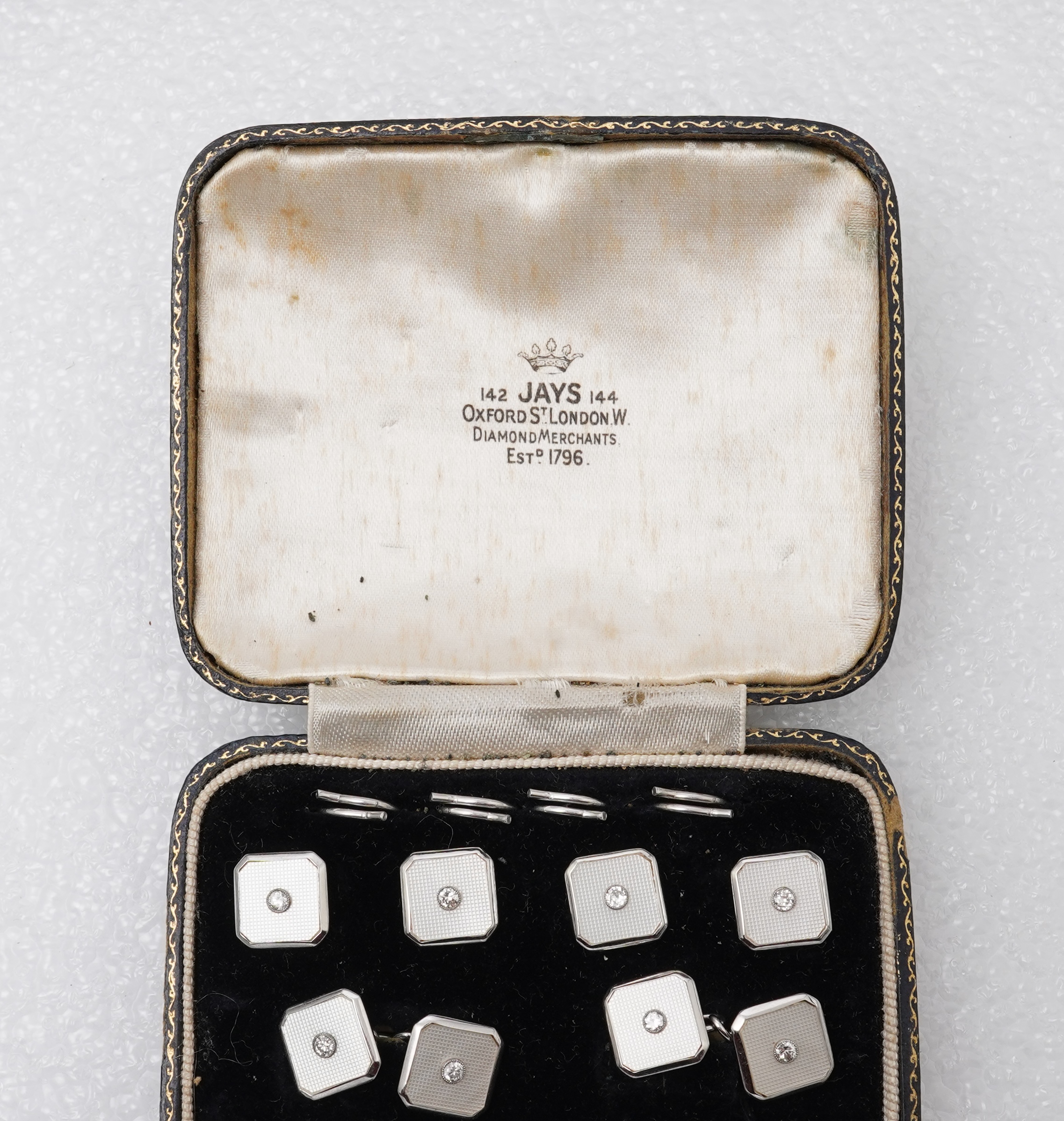 An Art Deco mother of pearl and diamond dress set, circa 1930